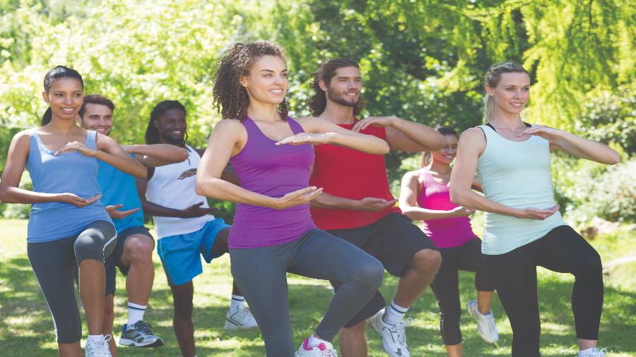 Stock-photo-Tai-Chi-in-the-park-472869642.jpg